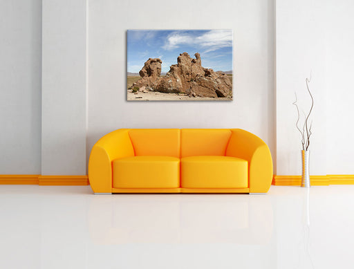 riesige Felsbrocken in der Wüste Leinwandbild über Sofa