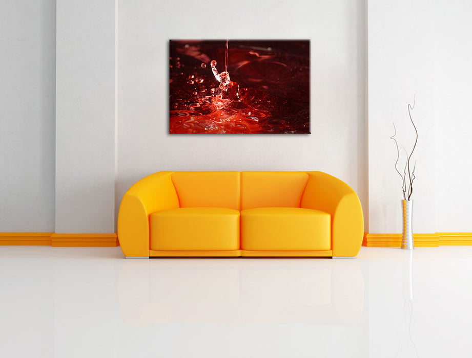 rote Flüssigkeit Leinwandbild über Sofa