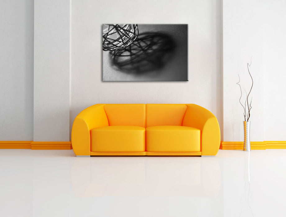 Schatten eines Heu Balls Leinwandbild über Sofa