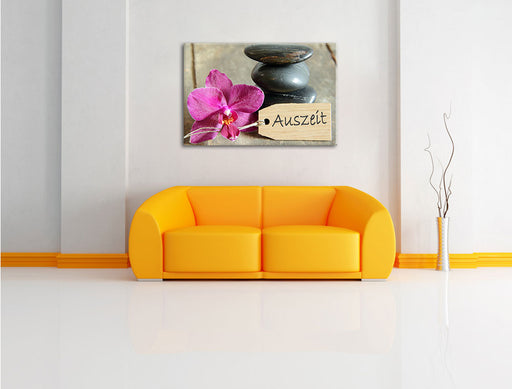 Auszeit Orchidee mit Zen Steinen Leinwandbild über Sofa