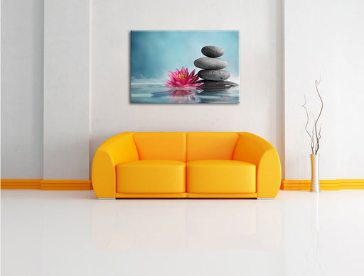 Seerosenblüte mit Zen Steinen Leinwandbild über Sofa