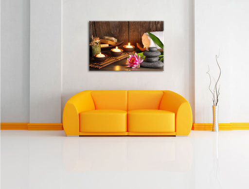 Kerzen mit Zen Steinen und Seerose Leinwandbild über Sofa