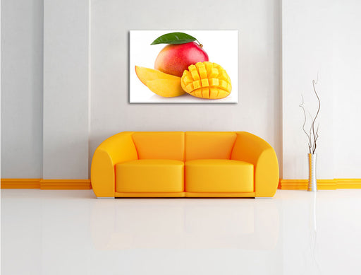 Zuckersüße aufgeschnittene Mango Leinwandbild über Sofa