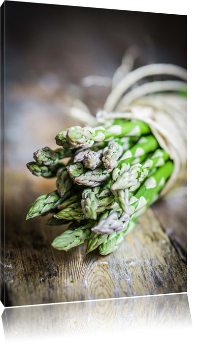 Pixxprint Spargel auf Holztisch, Leinwandbild