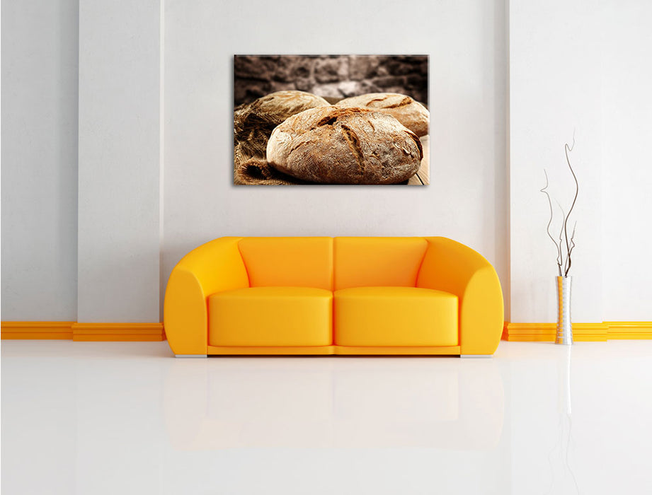 Frisch gebackenes Brot Leinwandbild über Sofa