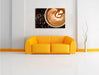 Tasse Kaffee mit Schaumherz Leinwandbild über Sofa