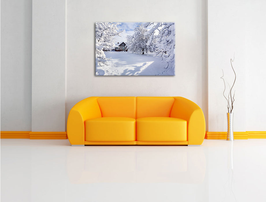 Winterlandschaft mit Hütte Leinwandbild über Sofa