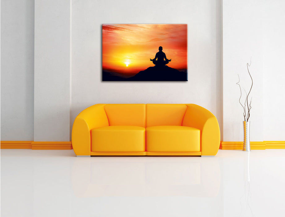 Meditation im Sonnenuntergang Leinwandbild über Sofa