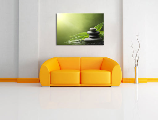 Zen Steine mit Blättern Leinwandbild über Sofa