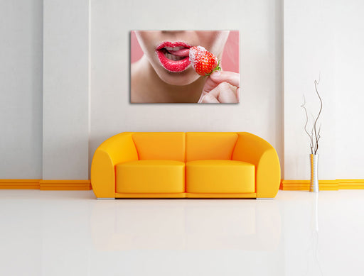 Erdbeere vor Lippen Leinwandbild über Sofa