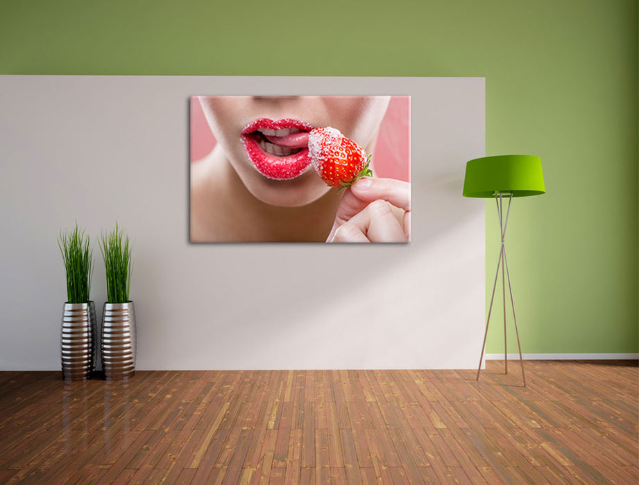 Erdbeere vor Lippen Leinwandbild im Flur