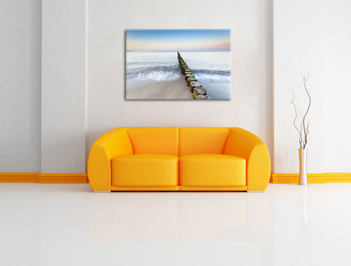 Baumstümpfe die ins Meer führen Leinwandbild über Sofa