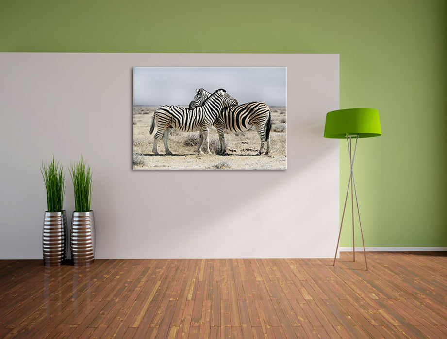 Schmusende Zebras Leinwandbild im Flur