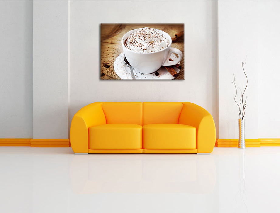 Kaffee mit viel Creme Leinwandbild über Sofa