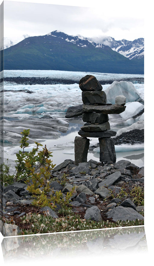 Steinmenschskulptur im Winter Leinwandbild