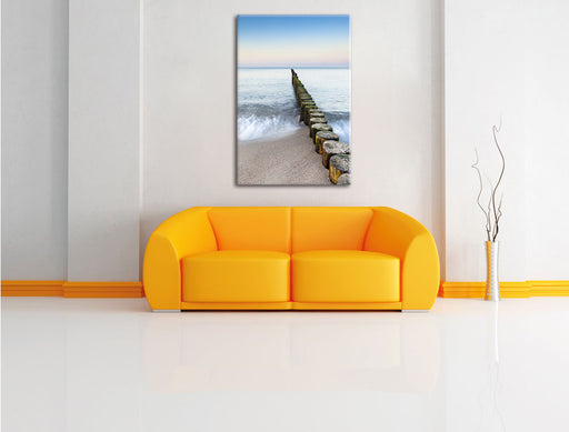 Wellenbrecher im Meer Leinwandbild über Sofa
