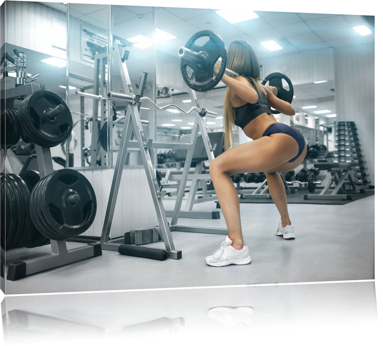 Pixxprint Sportliche Frau mit Hantelstange, Leinwandbild