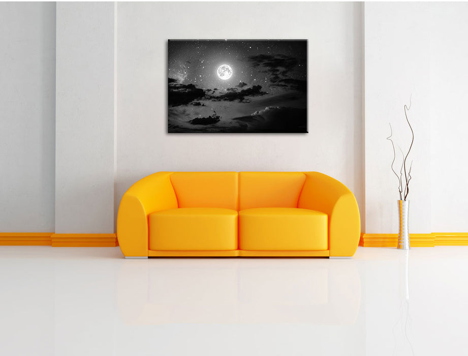 Leuchtender Mond am Nachthimmel B&W Leinwandbild über Sofa