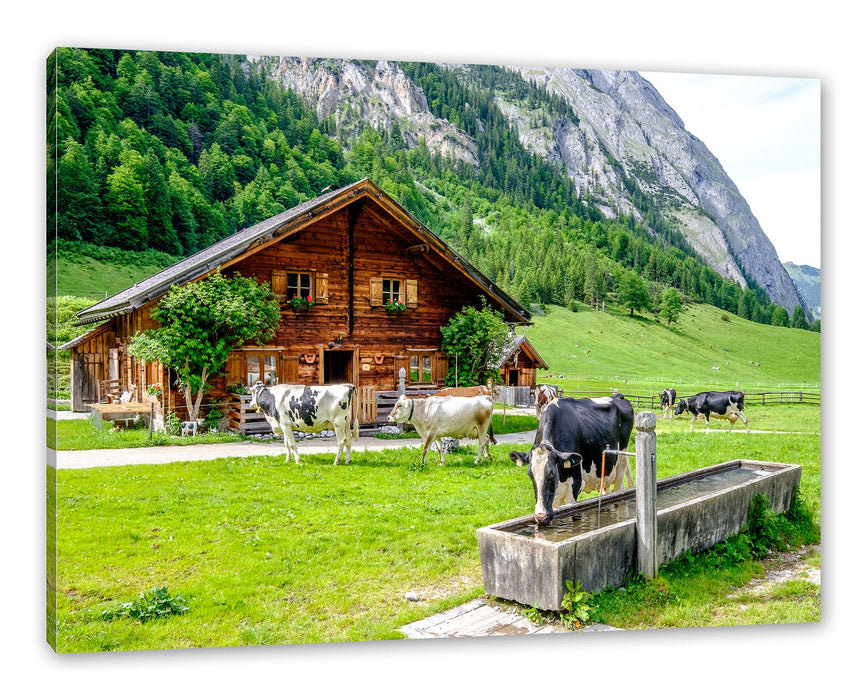 Pixxprint Kühe vor Blochhütte auf Albenweide, Leinwandbild