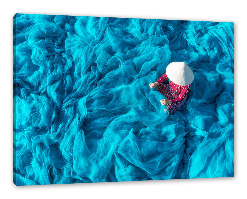 Pixxprint Vietnamesin repariert blaues Fischernetz, Leinwandbild