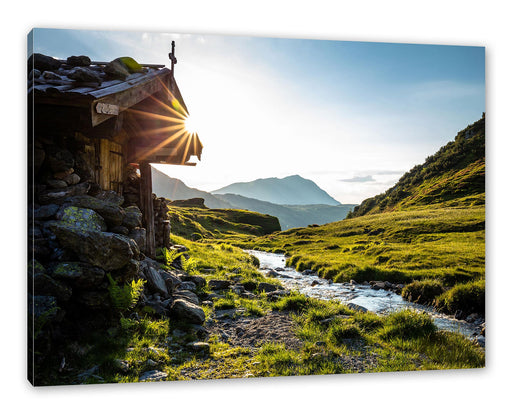 Almhütte am Bach bei Sonnenuntergang Leinwanbild Rechteckig