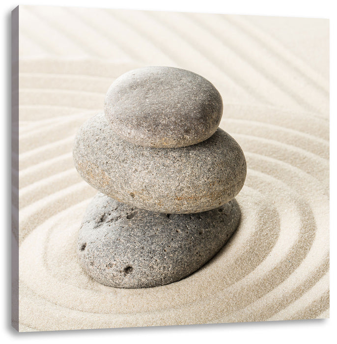 Steine in Sand mit Muster Leinwandbild Quadratisch