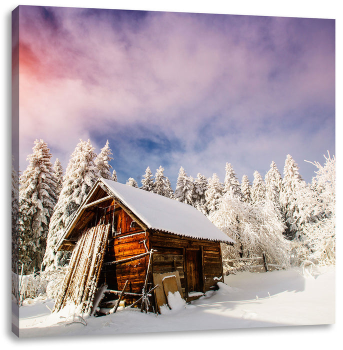 Holzhütte im Schnee Leinwandbild Quadratisch