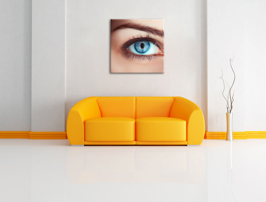 Auge einer Frau Leinwandbild Quadratisch über Sofa