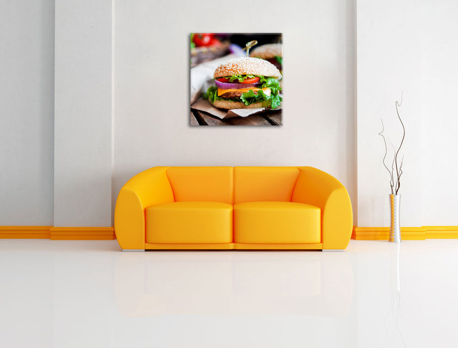 Burger und Pommes Leinwandbild Quadratisch über Sofa