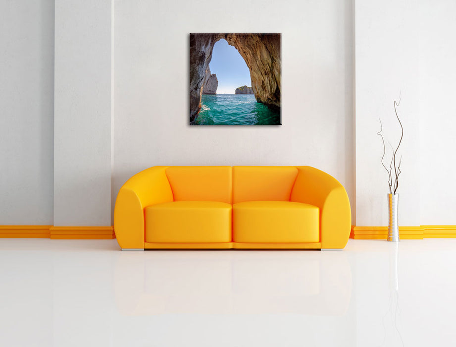 Felstor im Meer Leinwandbild Quadratisch über Sofa