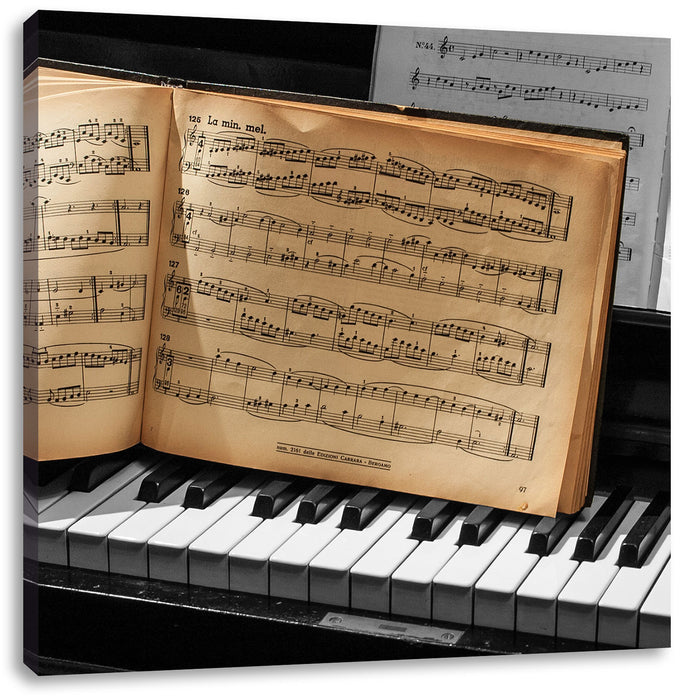 Notenbuch auf Piano Leinwandbild Quadratisch