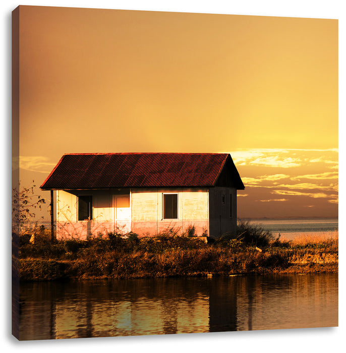Haus am See bei Sonnenuntergang Leinwandbild Quadratisch