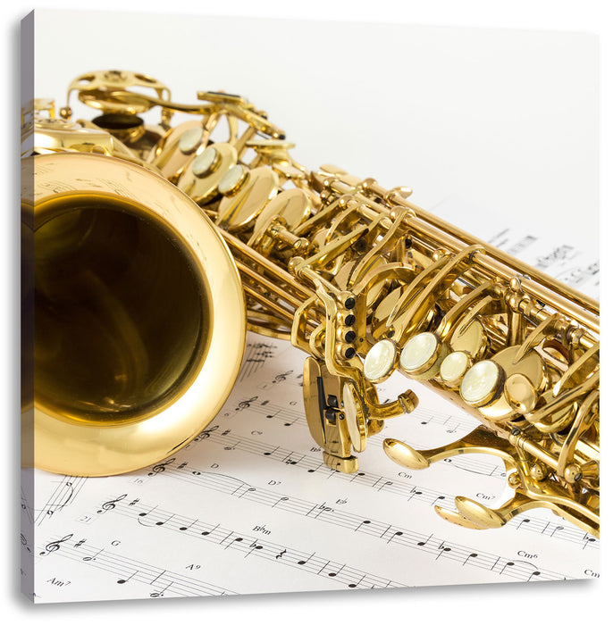 Saxophon auf Notenpapier Leinwandbild Quadratisch