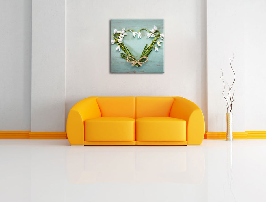 Herz aus Blumen Leinwandbild Quadratisch über Sofa