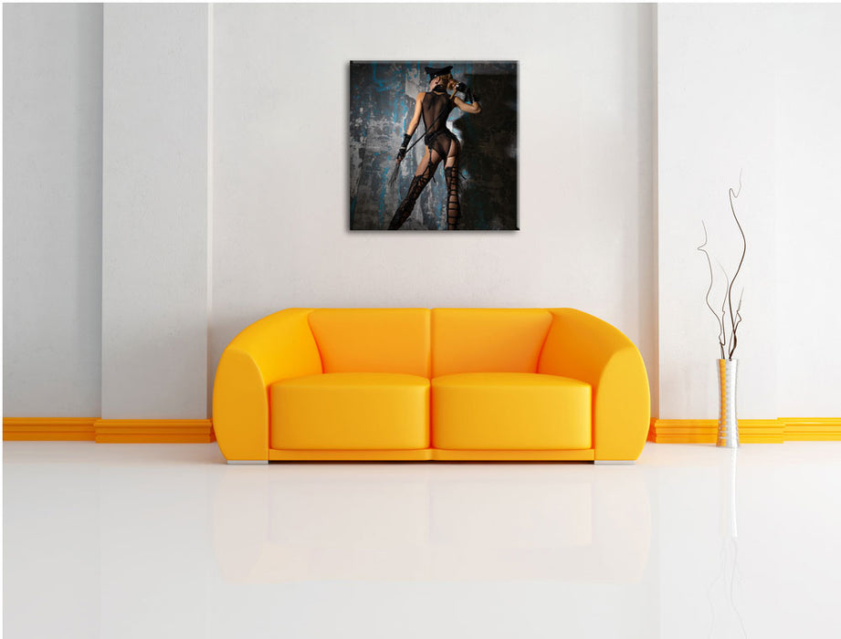 Frau im Dessou mit einer Peitsche Leinwandbild Quadratisch über Sofa