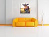 Kuh auf Blumenwiese Leinwandbild Quadratisch über Sofa