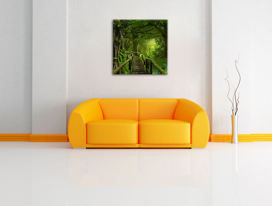 Weg durch den Tropenwald Leinwandbild Quadratisch über Sofa