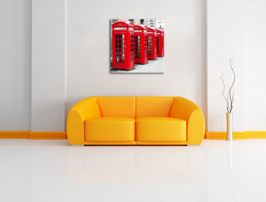 rote Londoner Telefonzellen Leinwandbild Quadratisch über Sofa