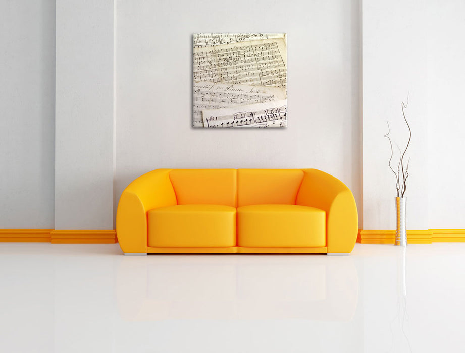 Stilvolle alte Notenbläter Leinwandbild Quadratisch über Sofa