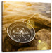 Kompass auf Steinen Reiselust Leinwandbild Quadratisch