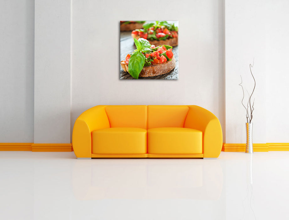 Köstliche Tomaten Bruchetta Leinwandbild Quadratisch über Sofa