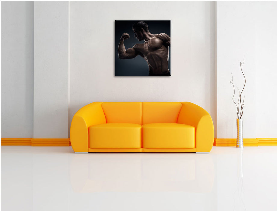 Starker Bodybuilder Leinwandbild Quadratisch über Sofa
