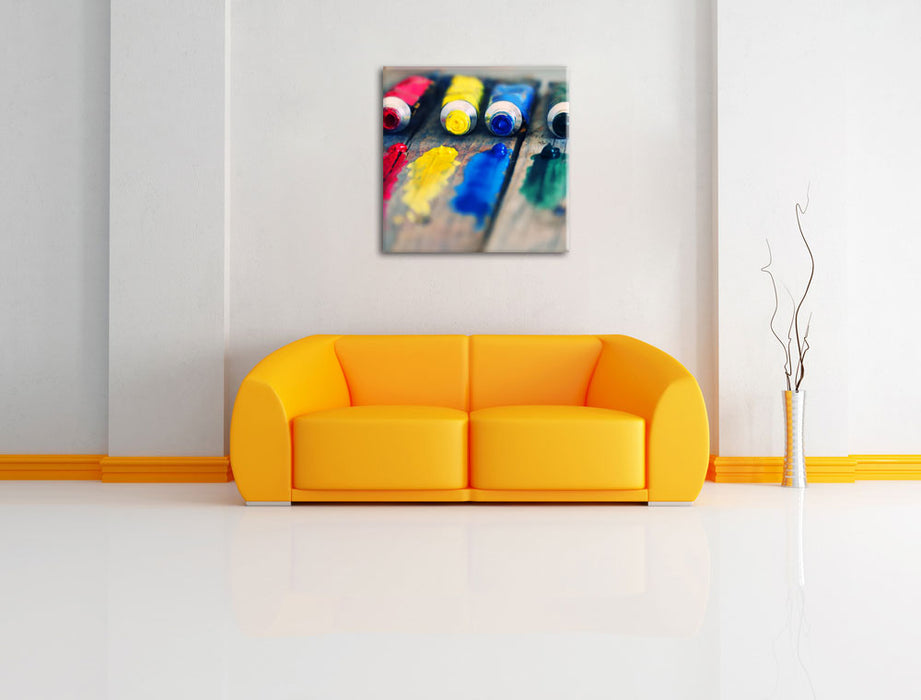 Farbtuben Leinwandbild Quadratisch über Sofa