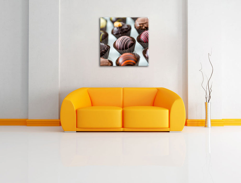 Süße Pralinen Leinwandbild Quadratisch über Sofa