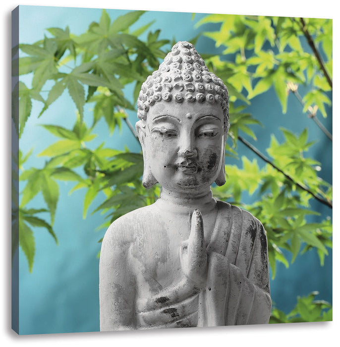 Buddha auf Steinen mit Monoi Blüte Leinwandbild Quadratisch