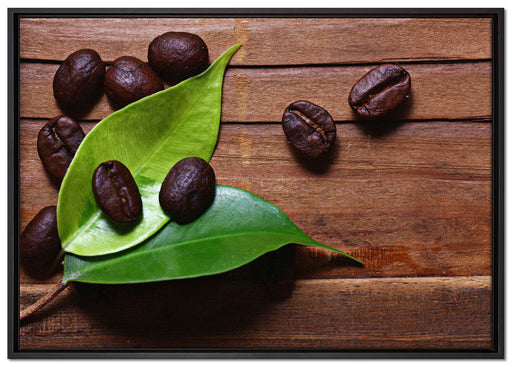 Kaffeebohnen auf Blättern auf Leinwandbild gerahmt Größe 100x70
