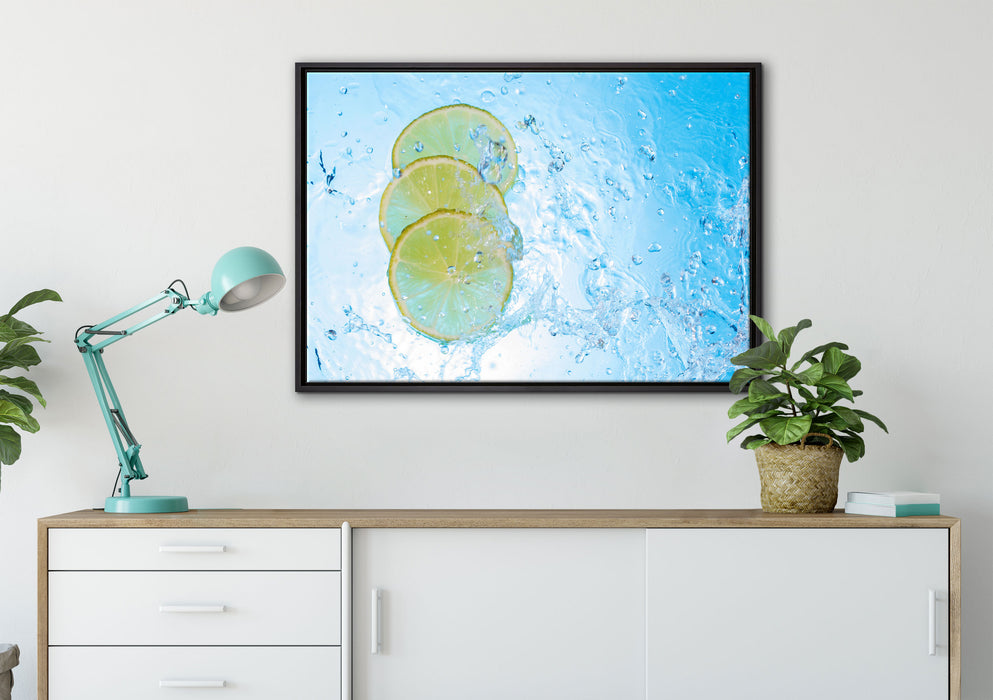 Zitrone fällt ins Wasser auf Leinwandbild gerahmt verschiedene Größen im Wohnzimmer