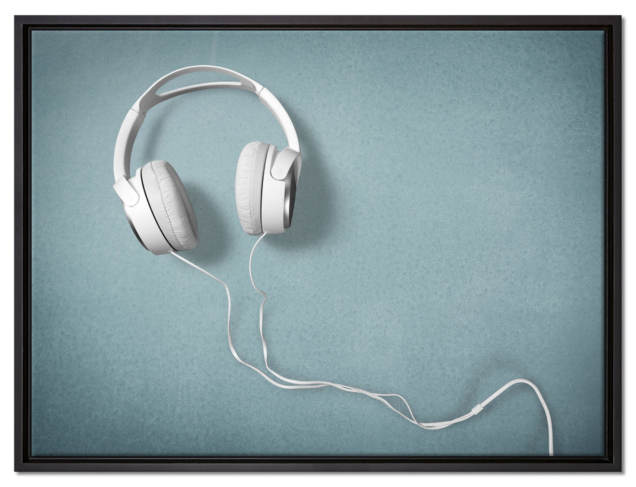Weiße Kopfhörer auf Leinwandbild gerahmt Größe 80x60