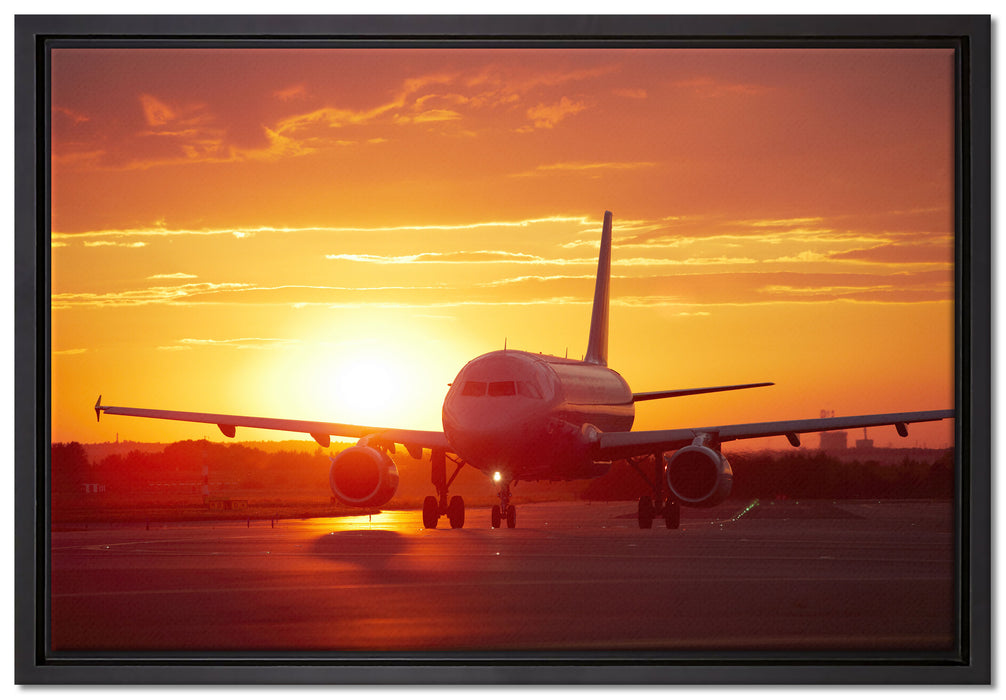 Flugzeug im Sonnenuntergang auf Leinwandbild gerahmt Größe 60x40