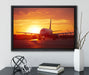 Flugzeug im Sonnenuntergang auf Leinwandbild gerahmt mit Kirschblüten